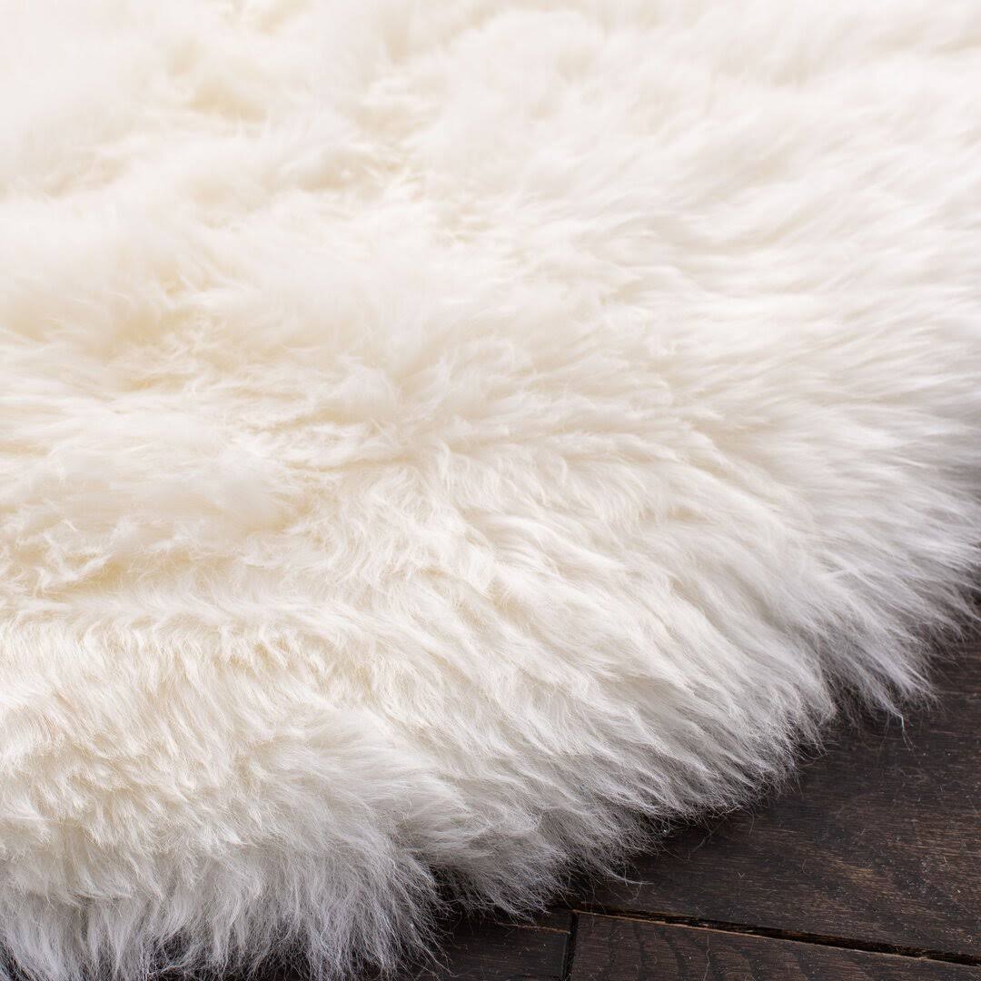 Mera Handmade Sheepskin White Area Rug AllModern Rug Size: Rectangle 2' x 5'